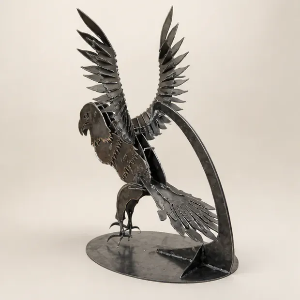 Rear studio visual revealing the eagle’s assembled feather plates