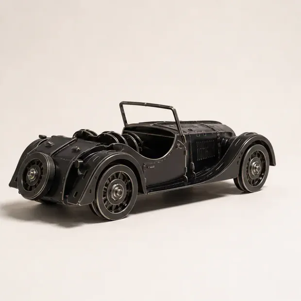 Rear three-quarter view of The Roadster’s open cockpit and wheels